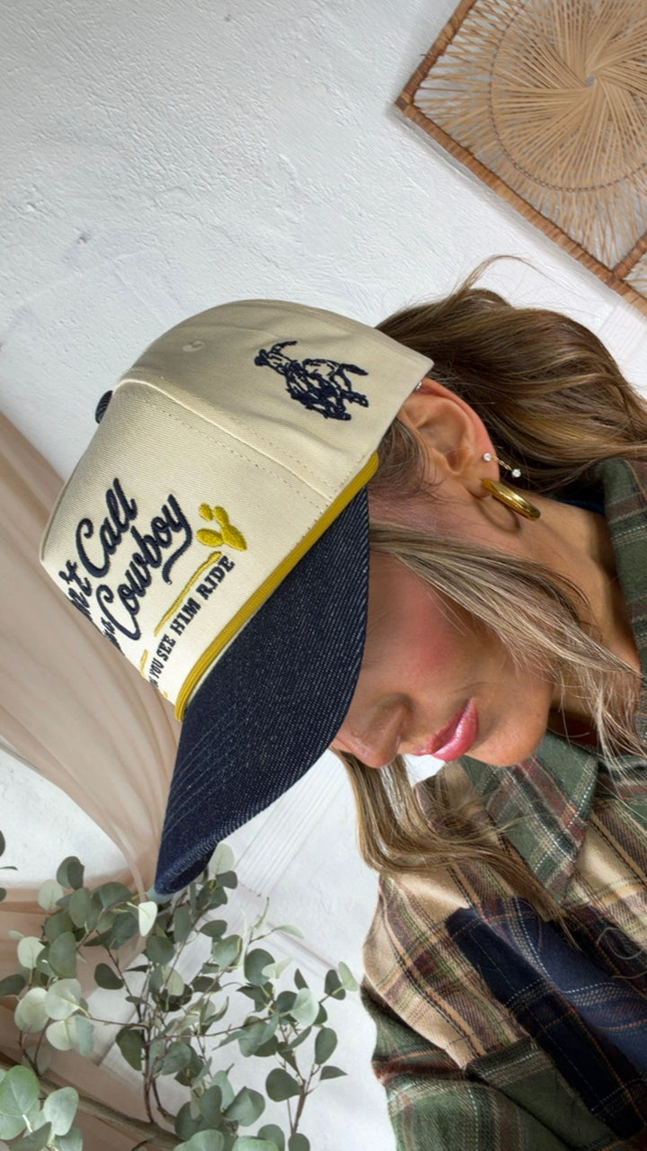 Don't Call Him A Cowboy Trucker Hat