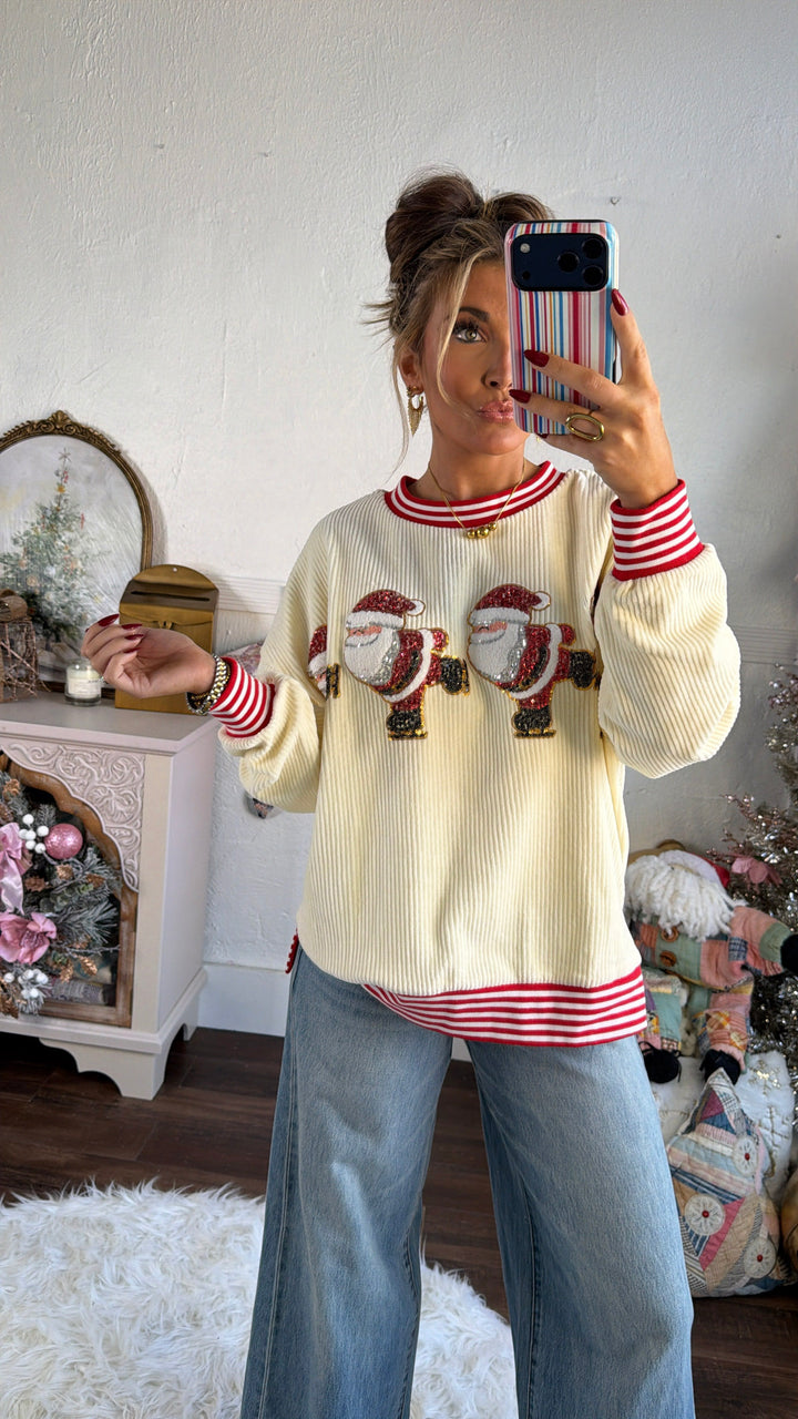 Holly Jolly Skatin’ Sequin Santa Sweater